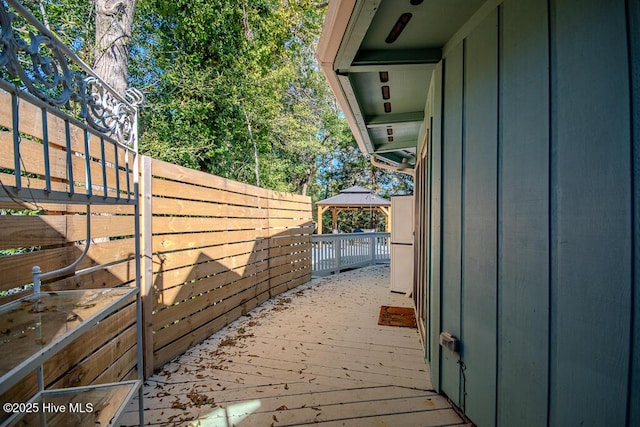 114 White Ash Dr, Pine Knoll Shores, NC 28512 - wooden deck featuring a gazebo