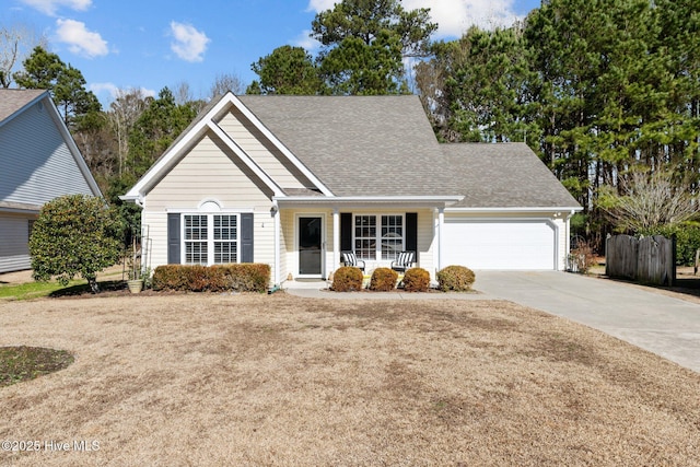 view of front facade with a garage and a porch