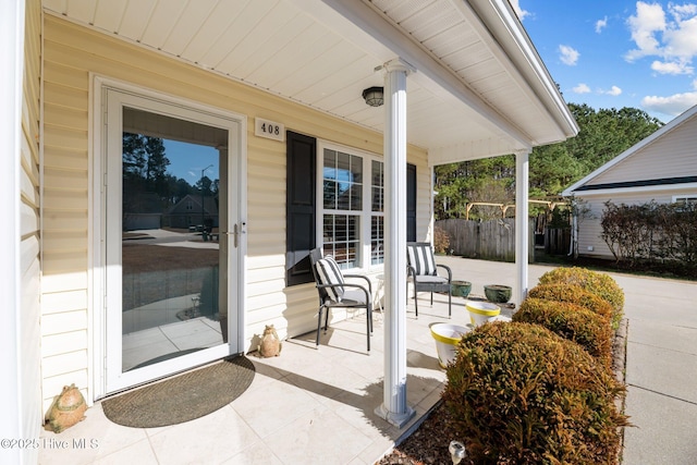 view of patio featuring covered porch