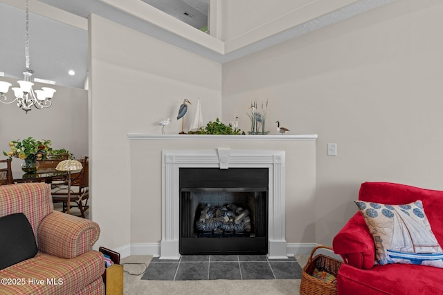 carpeted living room featuring an inviting chandelier