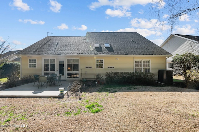 back of house featuring a patio and central air condition unit