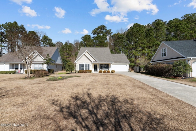 view of front facade with a garage and a front lawn