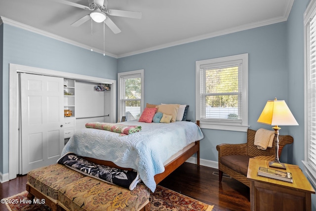 bedroom with multiple windows, crown molding, and dark wood-type flooring