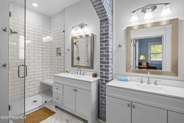 bathroom with vanity and an enclosed shower