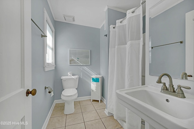 bathroom featuring ornamental molding, sink, tile patterned floors, and toilet