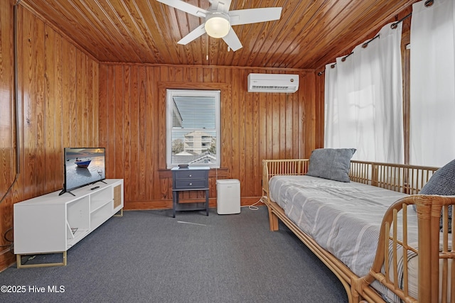 bedroom with an AC wall unit, wooden walls, and wood ceiling