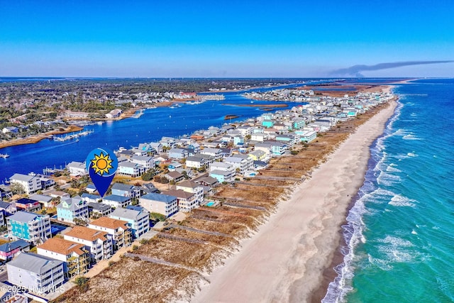 bird's eye view with a view of the beach and a water view