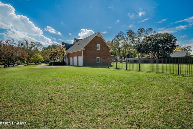 view of side of home featuring a yard