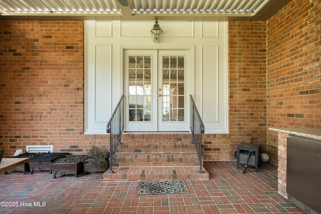 entrance to property featuring french doors