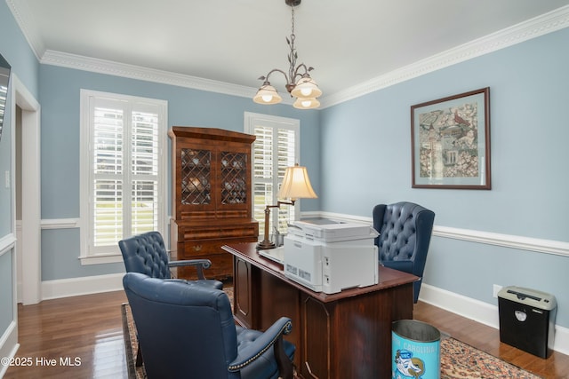 office space featuring an inviting chandelier, dark wood-type flooring, plenty of natural light, and crown molding