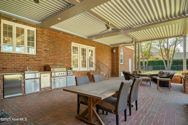 view of patio with grilling area and exterior kitchen