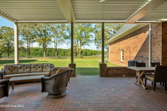 view of patio / terrace with outdoor lounge area and central AC