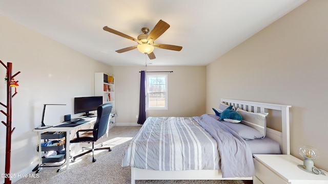 bedroom featuring a ceiling fan and carpet