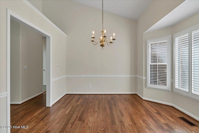 6 Elmhurst Pl, Pinehurst, NC 28374 - unfurnished dining area with wood finished floors, plenty of natural light, and a chandelier
