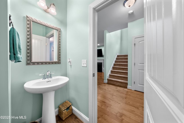 bathroom featuring sink and hardwood / wood-style floors