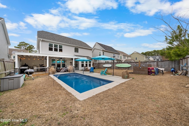 view of swimming pool featuring a patio area