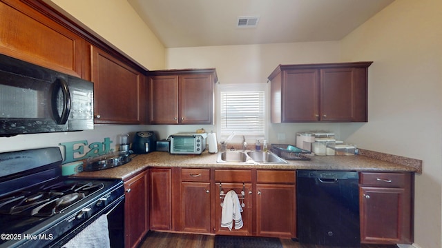 kitchen with sink, black appliances, and dark hardwood / wood-style floors