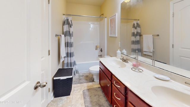 full bathroom with shower / tub combo with curtain, toilet, vanity, and tile patterned flooring