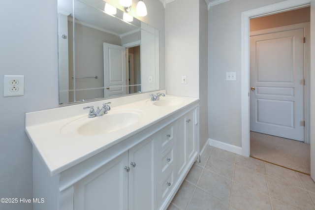 bathroom with vanity, tile patterned floors, and crown molding