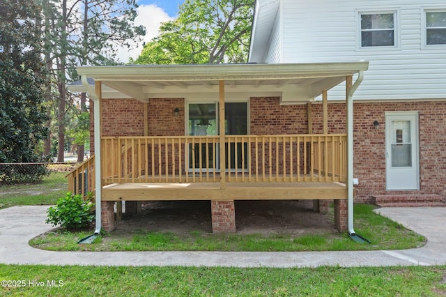 wooden deck featuring fence
