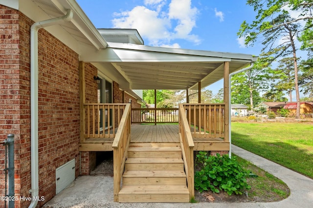 wooden deck with a yard