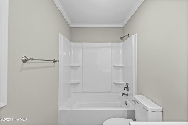 bathroom with crown molding and toilet