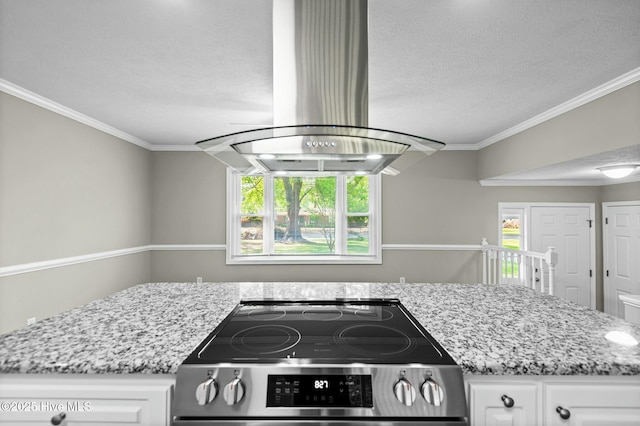 kitchen with a textured ceiling, stainless steel electric range, island range hood, and light stone counters