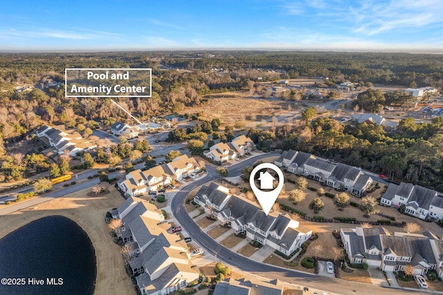 birds eye view of property with a residential view