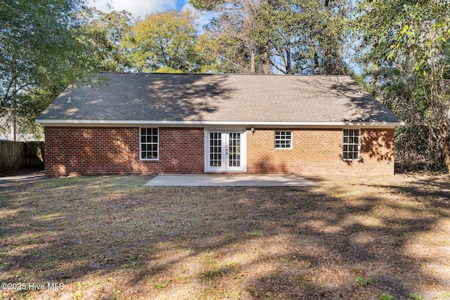 rear view of property with a patio area and french doors