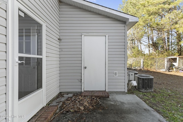 property entrance with central air condition unit