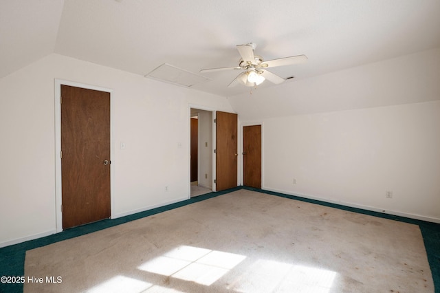 bonus room with lofted ceiling, ceiling fan, and carpet flooring