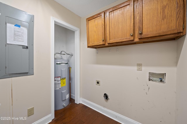 laundry area with cabinets, electric panel, hookup for a washing machine, electric dryer hookup, and electric water heater