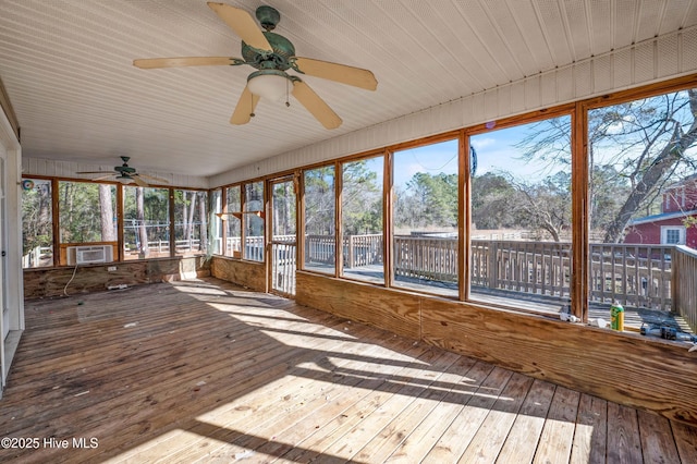 unfurnished sunroom with cooling unit