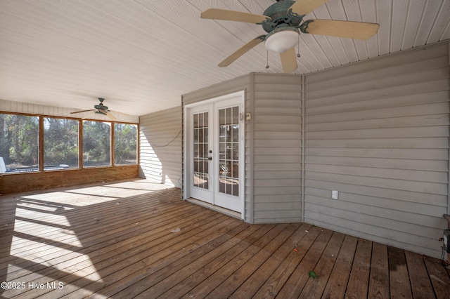 wooden deck featuring french doors and ceiling fan