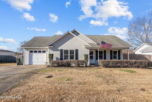 ranch-style home with a garage and a front yard