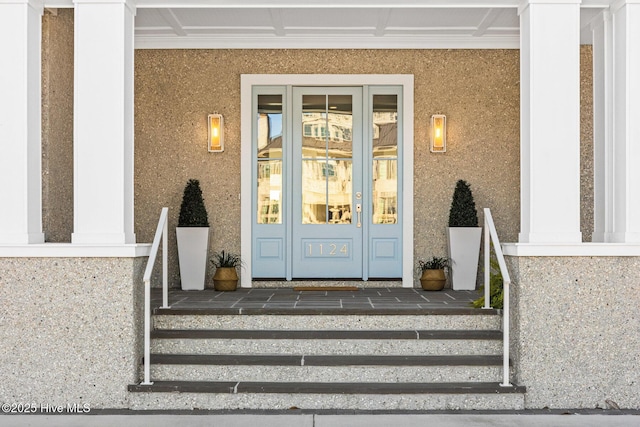 entrance to property with covered porch