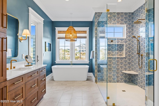 bathroom featuring crown molding, a healthy amount of sunlight, and separate shower and tub