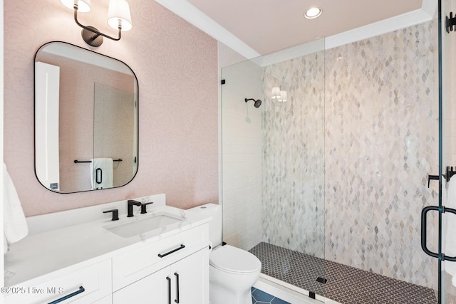 bathroom featuring ornamental molding, walk in shower, vanity, and toilet