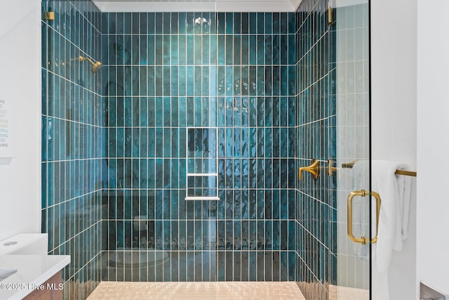 bathroom featuring vanity and walk in shower