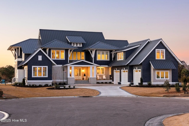 modern farmhouse featuring a garage