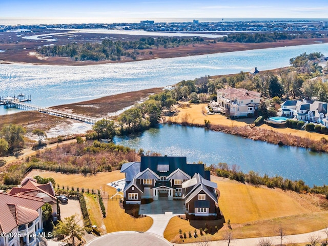 drone / aerial view with a water view