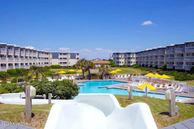 view of swimming pool featuring a patio