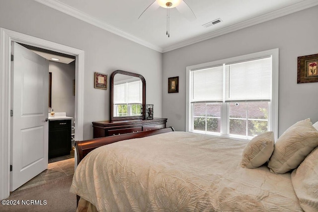 bedroom with ornamental molding, carpet flooring, connected bathroom, and ceiling fan