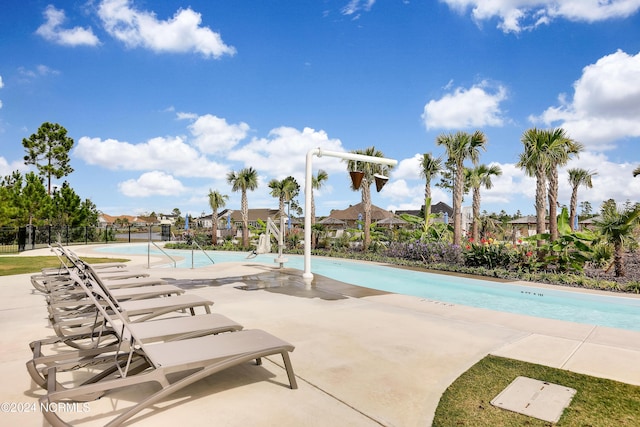 view of swimming pool featuring a patio