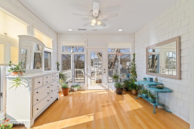 interior space featuring ceiling fan