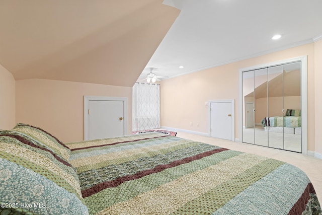 carpeted bedroom with vaulted ceiling and ornamental molding