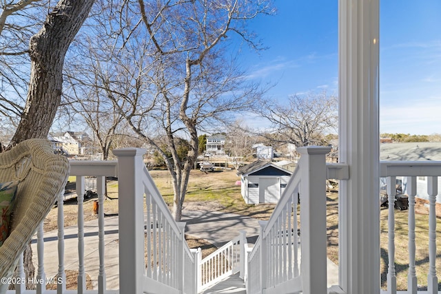 wooden deck with a shed