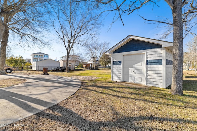 garage featuring a yard