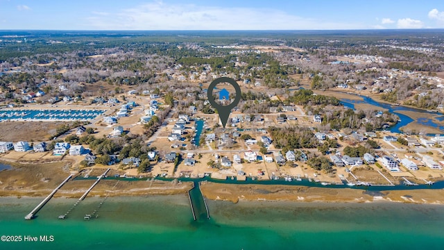 drone / aerial view featuring a water view