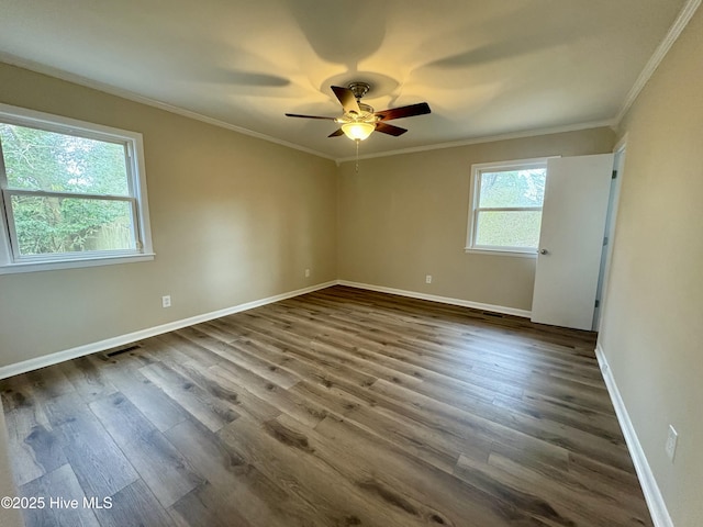 spare room with ornamental molding, hardwood / wood-style floors, and ceiling fan